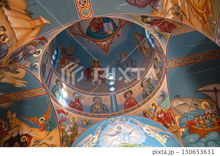 Colorful frescoes depicting religious scenes decorating the ceiling of a Agios Nikolaos Church in Paralimni, Cyprus 130653631