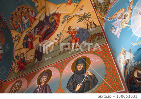 Interior view of Agios Nikolaos orthodox church featuring religious frescoes and icons. Paralimni, Cyprus Interior view of Agios Nikolaos orthodox church featuring religious frescoes and icons. Paralimni, Cyprus 130653633