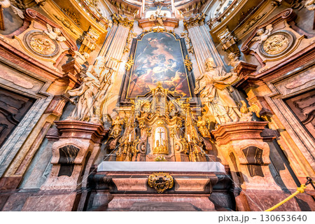 Ornate altar with gold and marble detailing in St. Nicholas Church. Mala Strana, Prague, Czech Republic Ornate altar with gold and marble detailing in St. Nicholas Church. Mala Strana, Prague, Czech Republic 130653640