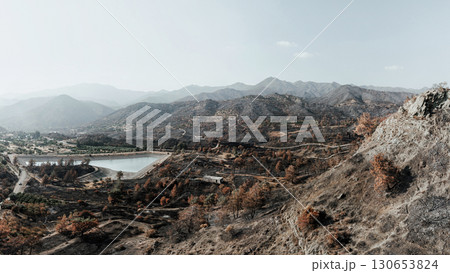 Water reservoir surviving a devastating forest fire near Arakapas village. Limassol District, Cyprus 130653824