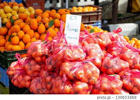 Fresh tangerines and oranges waiting for customers at the farmers market 130653868