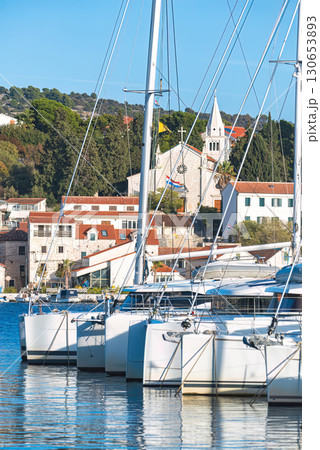 Sailboats docked in picturesque Rogoznica, Croatia, on sunny day Sailboats docked in picturesque Rogoznica, Croatia, on sunny day 130653893