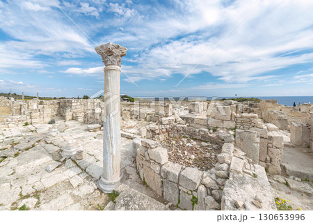 Kourion archaeological site ruins with columns under blue sky with clouds. Limassol District, Cyprus 130653996