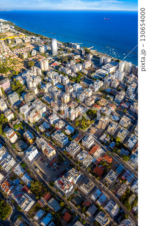 Aerial view of Limassol city with buildings and streets leading to the sea. Cyprus 130654000