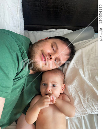 Father and Baby Enjoying a Happy Moment 130654150