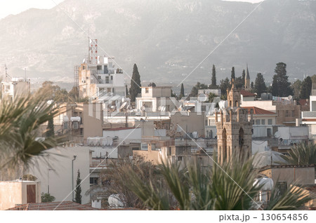 Nicosia Old Town cityscape with church tower and Pentadactylos mountains in background, Cyprus Nicosia Old Town cityscape with church tower and Pentadactylos mountains in background, Cyprus 130654856