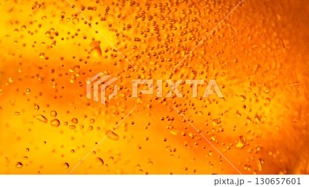 Macro Shot of Pouring Beer Drink , abstract bacground Macro Shot of Pouring Beer Drink , abstract bacground 130657601