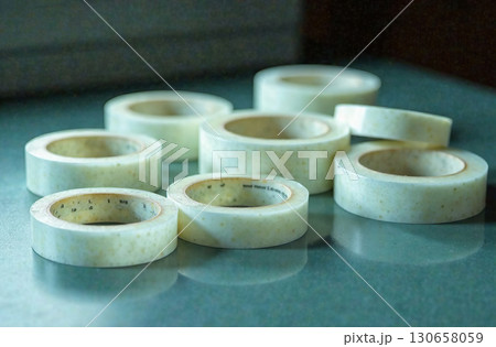 Adhesive tape for packaging, workplace desk in office. AI Generative 130658059