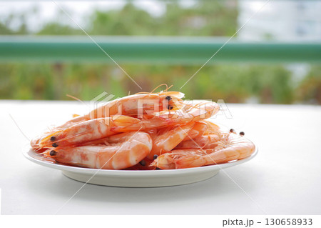 Boiled Langoustines on Outdoor Table 130658933