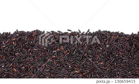 Close-up border of riceberry rice grains on white background. Perfect for use in food advertising 130659415
