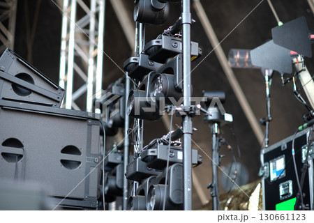 Concert Stage Equipment Featuring LED Spotlights and Audio Systems 130661123