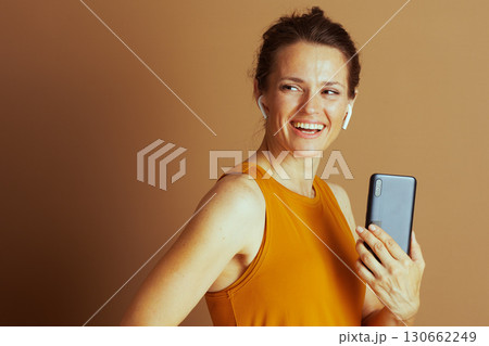 Cheerful Woman Enjoying Music Cheerful Woman Enjoying Music 130662249