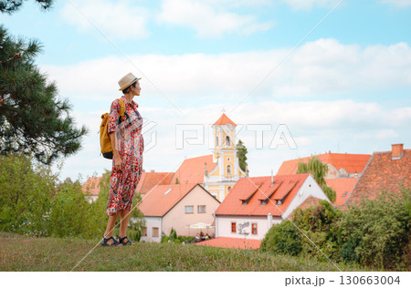 Woman Walking Through the Historic Center of Varazdin Woman Walking Through the Historic Center of Varazdin 130663004
