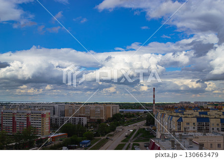 Panoramic cityscape with clouds and apartments 130663479