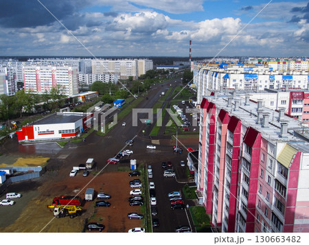Panoramic cityscape with clouds and apartments 130663482