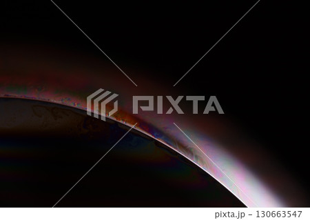 Colourful interference pattern, chemical liquid film, macro abstraction, scientific background, liquid edge 130663547