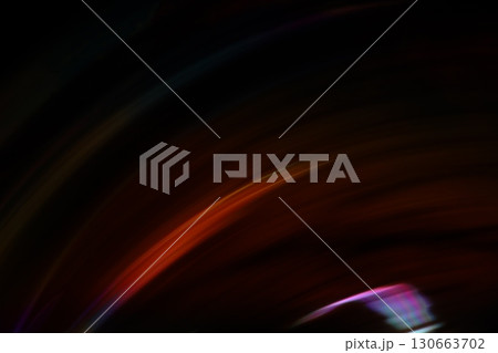 Curved lines of light on a dark background Curved lines of light on a dark background 130663702