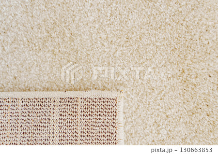 close-up. beige Interior pile carpet made of polypropylene. close-up. beige Interior pile carpet made of polypropylene. 130663853