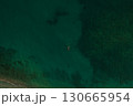 Aerial top nature view above green turquoise Thracian sea Greece Ellada. Beautiful woman bikini  130665954