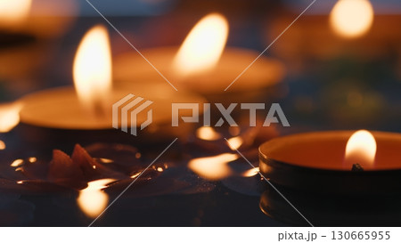 Candles floating in river water for Diwali festival Candles floating in river water for Diwali festival 130665955