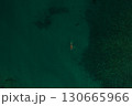 Aerial top nature view above green turquoise Thracian sea Greece Ellada. Beautiful woman bikini  130665966