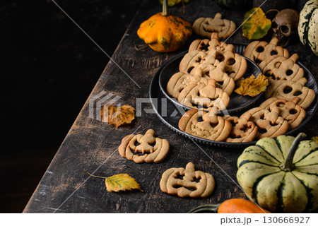 Halloween cookies in shape of jack-o-lantern Halloween cookies in shape of jack-o-lantern 130666927