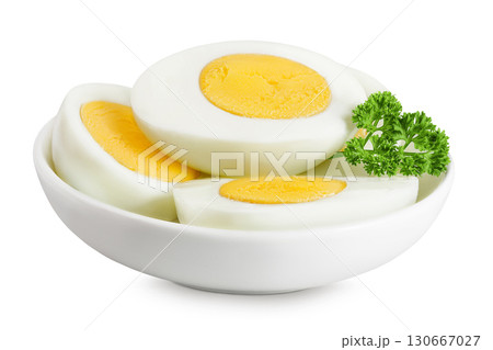Boiled chicken egg in ceramic bowl isolated on white background. Boiled chicken egg in ceramic bowl isolated on white background. 130667027
