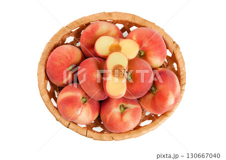 chinese flat donut peaches in a wicker basket isolated on white background. Top view. Flat lay 130667040