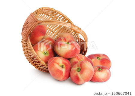 chinese flat donut peaches in a wicker basket isolated on white background 130667041
