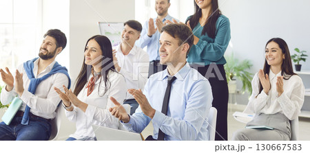 Happy business people applauding, office team cheering celebration, greeting, friends showing 130667583