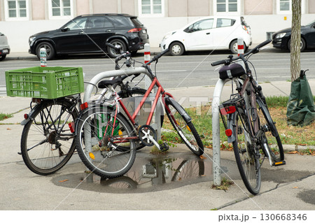 Bicycle parking with parked bicycles in a European city 130668346