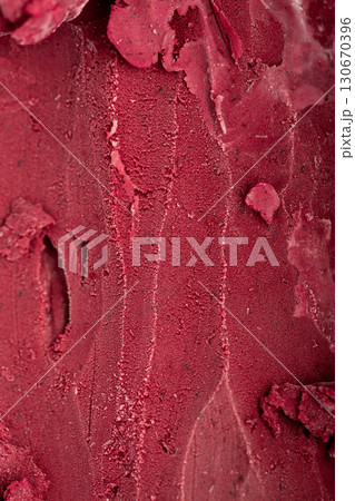 Close-up texture of rich red berry sorbet, vibrant and refreshing frozen dessert background 130670396