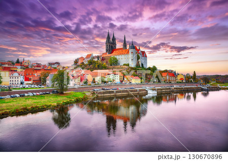 Amazing view on Albrechtsburg castle and cathedral on the River Elbe with dramatic sunset. Amazing view on Albrechtsburg castle and cathedral on the River Elbe with dramatic sunset. 130670896