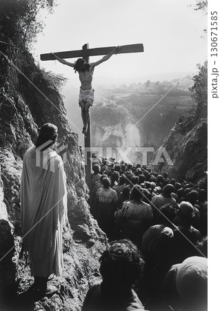 Jesus Christ nailed to the cross with a crowd gathered at the hilltop in Jerusalem 130671585