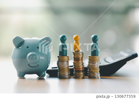 Money box filled with coins, saving cash, banking wisely, making sound investments can build financial wealth, personal finance and overall economy through proper business and currency management. 130677359