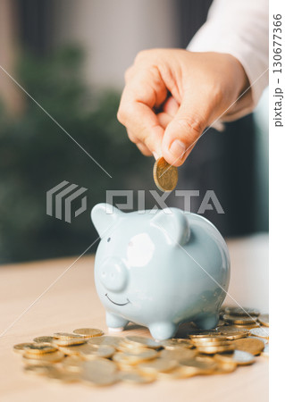 Hand holding coin symbolizes saving, investment, smart finance decisions money, currency, cash financial wealth, driving business growth, economic stability, long-term success in banking economy. Hand holding coin symbolizes saving, investment, smart finance decisions money, currency, cash financial wealth, driving business growth, economic stability, long-term success in banking economy. 130677366