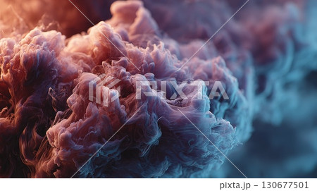 Golden and turquoise ink mixing in water creating stunning visuals 130677501