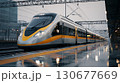 Modern high-speed train stands at station platform, ready for departure 130677669