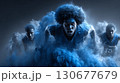 Basketball players running through blue smoke effect 130677679