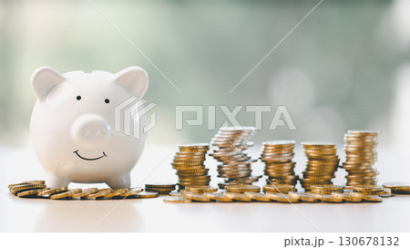 Money box filled with coins, saving cash, banking wisely, making sound investments can build financial wealth, personal finance and overall economy through proper business and currency management. Money box filled with coins, saving cash, banking wisely, making sound investments can build financial wealth, personal finance and overall economy through proper business and currency management. 130678132