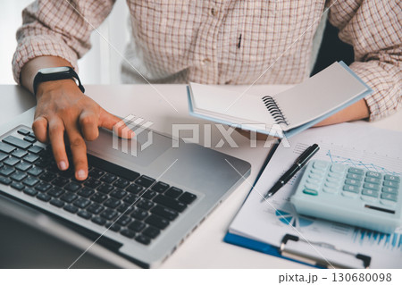 Businesswoman analysis with financial data, marketing business strategy project, Business financing accounting banking concept, finances, calculate about cost to real estate investment, tax system. Businesswoman analysis with financial data, marketing business strategy project, Business financing accounting banking concept, finances, calculate about cost to real estate investment, tax system. 130680098