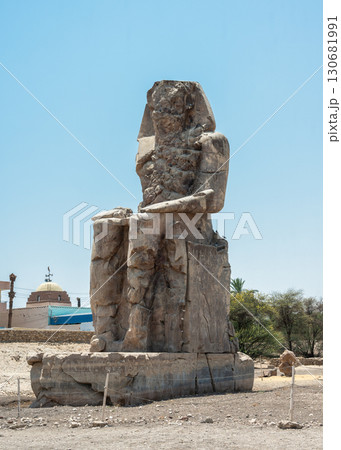 The Colossi of Memnon Standing Against a Mountainous Backdrop The Colossi of Memnon Standing Against a Mountainous Backdrop 130681991
