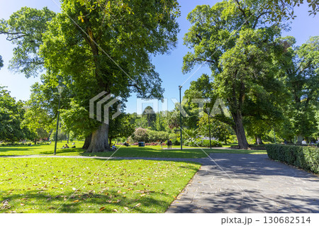 Melbourne, Australia - January 3, 2024 : View of Fitzroy Gardens in summertime in Melbourne, Australia on January 3, 2024. Melbourne, Australia - January 3, 2024 : View of Fitzroy Gardens in summertime in Melbourne, Australia on January 3, 2024. 130682514