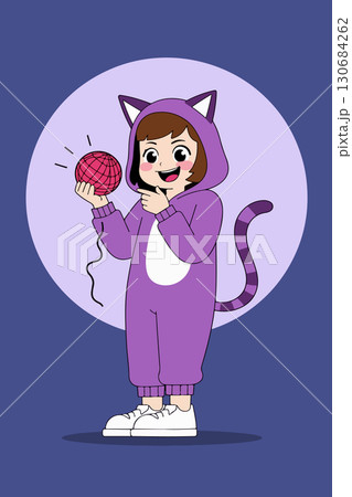 Girl in Cat Costume Holding Yarn Ball 130684262
