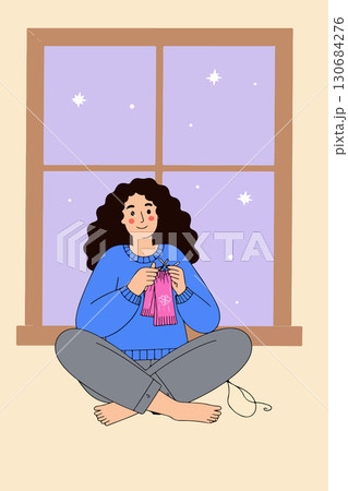 Woman Knitting by the Window at Night Woman Knitting by the Window at Night 130684276