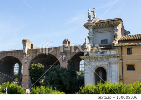 Rome, Italy - August 17, 2019: Santa Francesca Romana - medieval church at the Roman Forum Rome, Italy - August 17, 2019: Santa Francesca Romana - medieval church at the Roman Forum 130685036