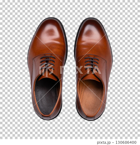Brown leather shoes isolated on white background. 130686400