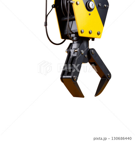 Yellow industrial crane hook for heavy lifting on a white background Yellow industrial crane hook for heavy lifting on a white background 130686440
