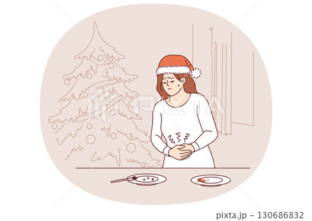Stomach pain caused by overeating at christmas dinner plagues woman in need of medication Stomach pain caused by overeating at christmas dinner plagues woman in need of medication 130686832