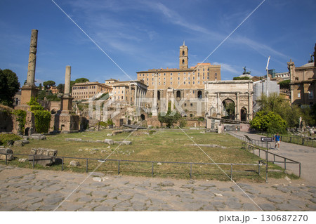 Rome, Italy - August 17, 2019: View of the ancient structures of the Roman Forum Rome, Italy - August 17, 2019: View of the ancient structures of the Roman Forum 130687270